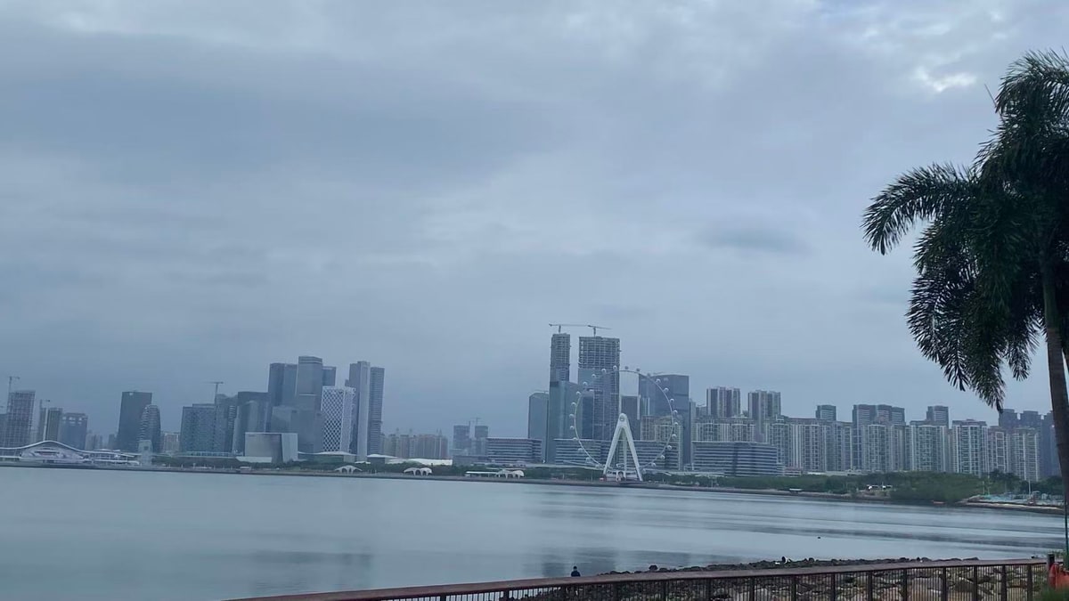 Bay Glory Ferris wheel seen across the water from Qianhai Stone Park in Shenzhen